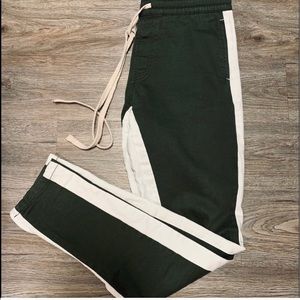 Green Track Joggers | white stripes